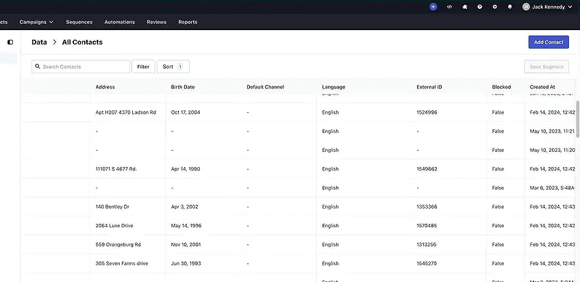 Whippy contacts dashboard showing a searchable contact list with custom fields, including address, birth date, preferred messaging channel, language, external ID, contact status, and creation date, with filtering and sorting options
